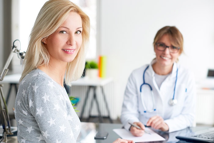 Woman consulting with a doctor about Botox treatment options