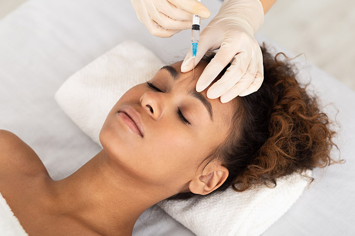Botox treatment for glabellar frown lines